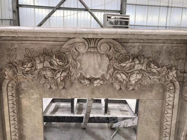 Carved Rose Marble Fireplace